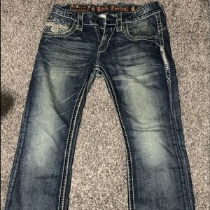 31 32. Rip in the crotch, patch it and you still have a great pair of jeans